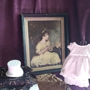 Antique vintage framed art Victorian girl girl with her hands on her heart.